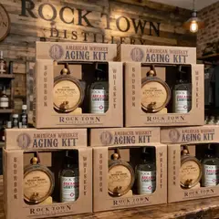 Rock Town Distillery American whiskey aging kits stacked on retail display table in gift shop